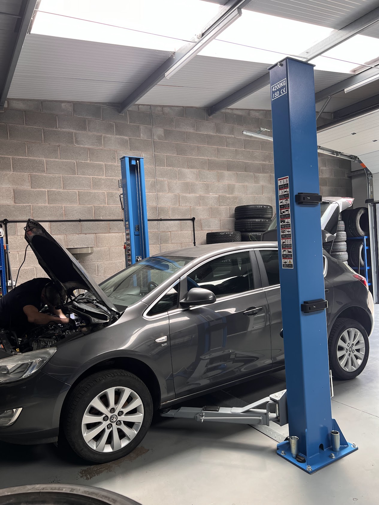 Vehicle on ramp inside the workshop